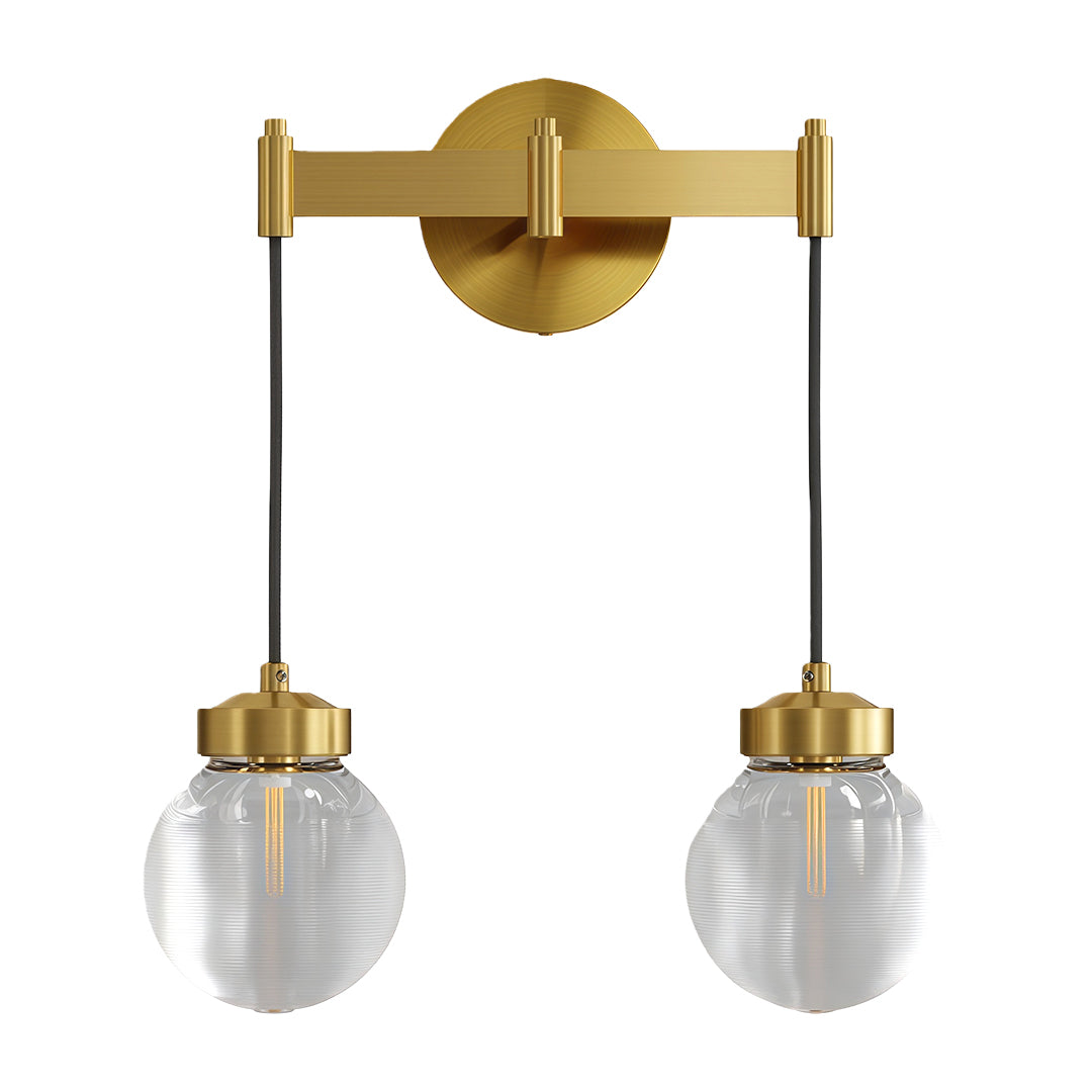 Small modern chandeliers with antique brass dual-arm configuration and glass globes