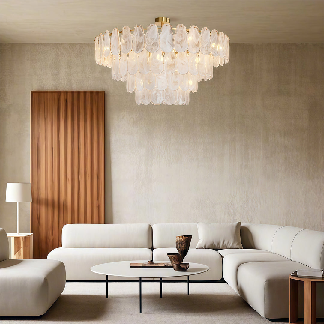 Luxury midcentury modern chandeliers with antique brass finish and vintage-inspired glass panel design.