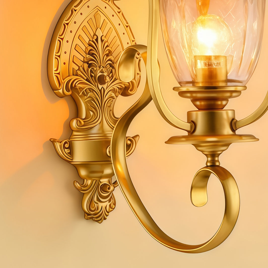 Detailed antique-style Copper Outdoor Wall Sconces featuring ornate metalwork and warm glowing bulb design.