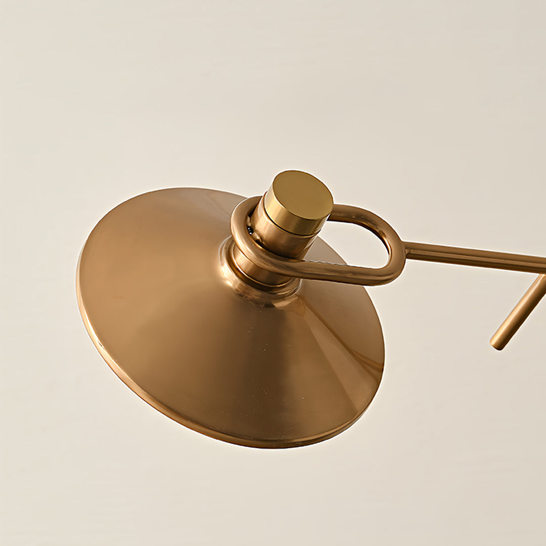 Antique-style vintage gold floor lamp featuring round shade with warm metallic finish for timeless home decor