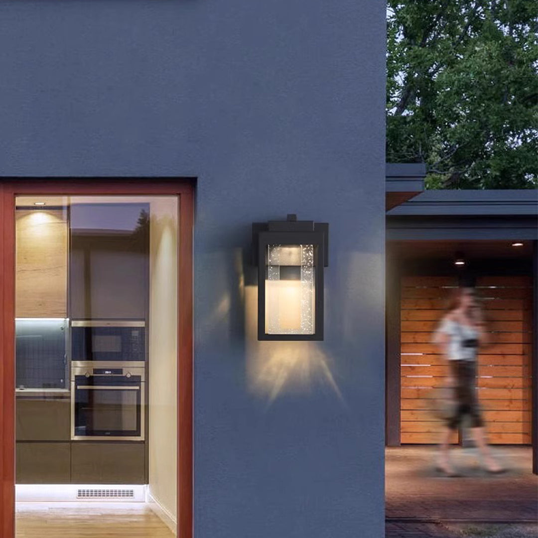 Modern apartment building exterior featuring coordinated outdoor lighting design