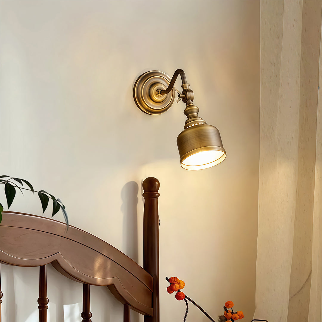 Architectural LED wall light lamp with glass shade chandelier styling providing task lighting above staircase with vintage appeal.