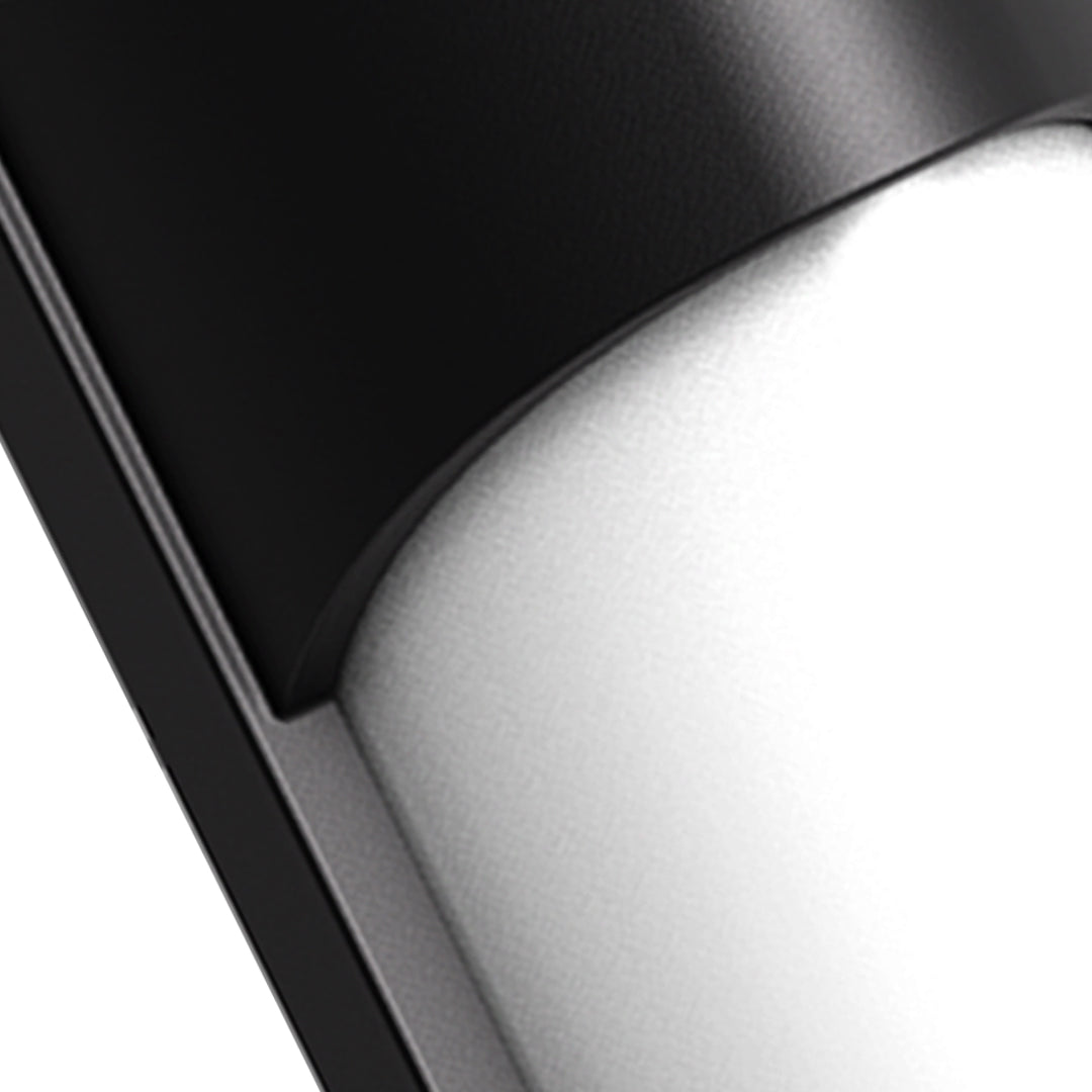 Architectural detail showing minimalist wall sconce with clean lines and integrated mounting system