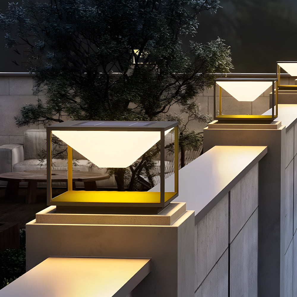 Architectural installation featuring solar pillar lights providing eco-friendly illumination for modern outdoor entertainment area