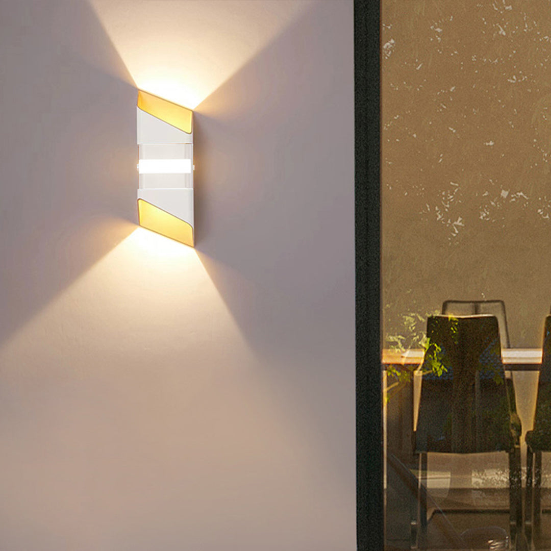 Modern architectural wall light with clean lines casting upward and downward illumination