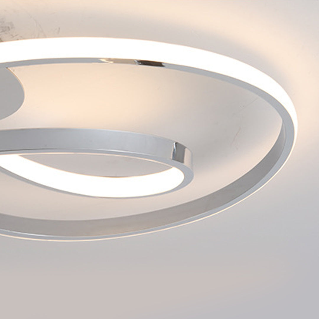 Art deco ceiling light flush mount perspective highlighting curved LED band design