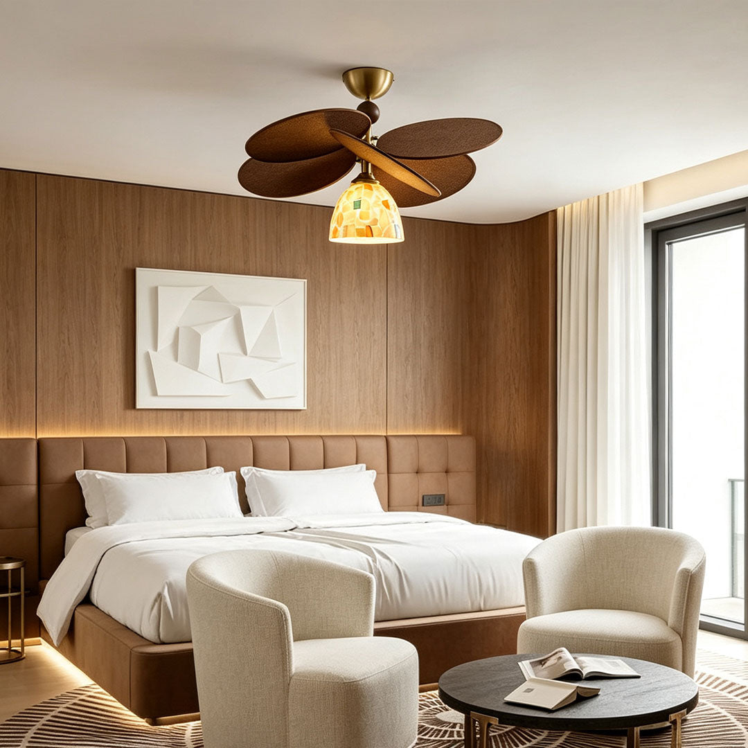Art deco flush mount light fixture installed in a luxury bedroom, featuring decorative wood accents and stained glass lighting.