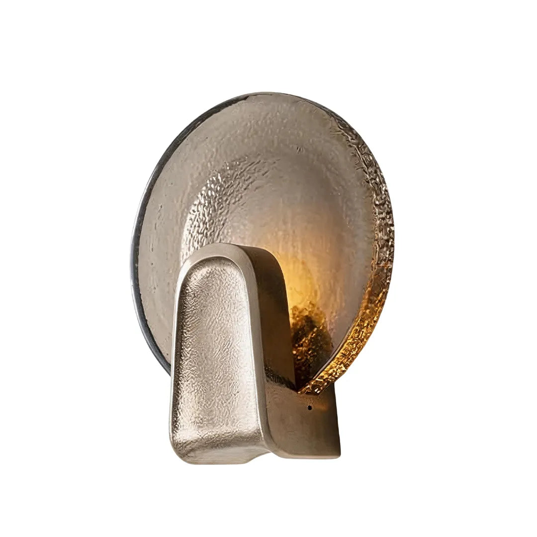 Art deco wall sconce lighting in Gold-Smoky Gray with a round glass shade on a white background.