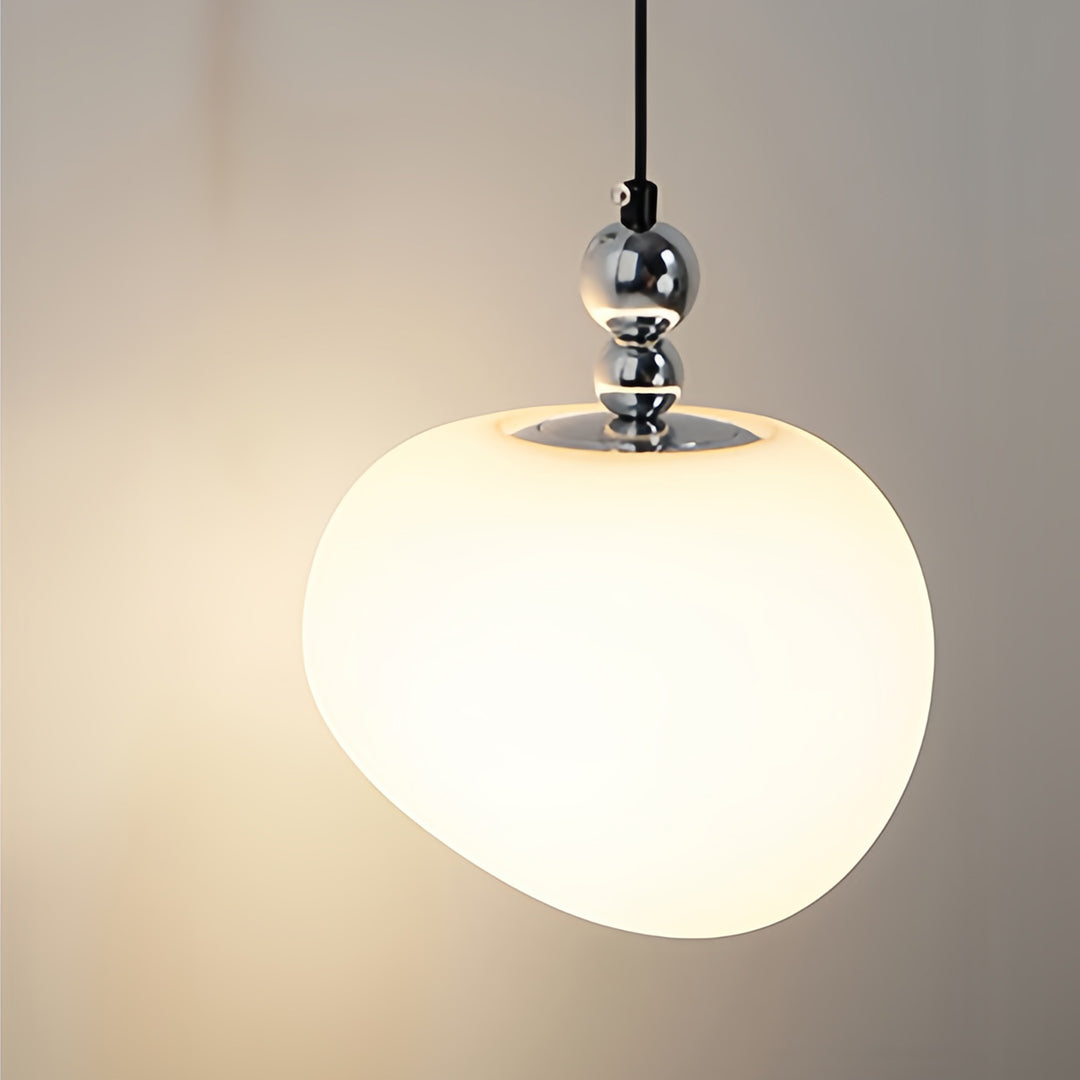 Art deco wall sconce lighting with white opal glass apple-shaped shade suspended from chrome fitting