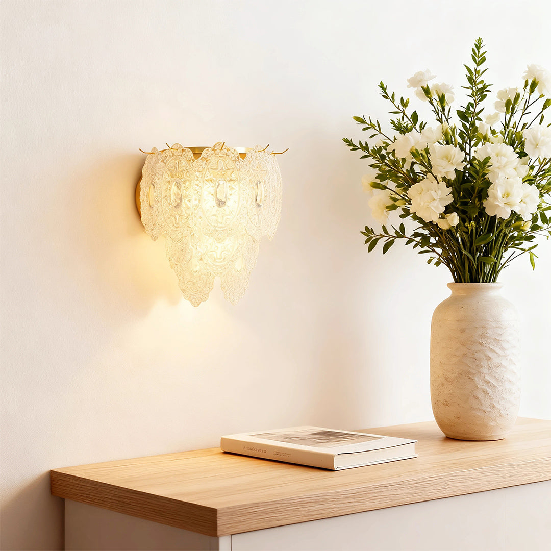 Modern luxury chandeliers style art wall lights creating ambient glow near wooden shelf with flowers