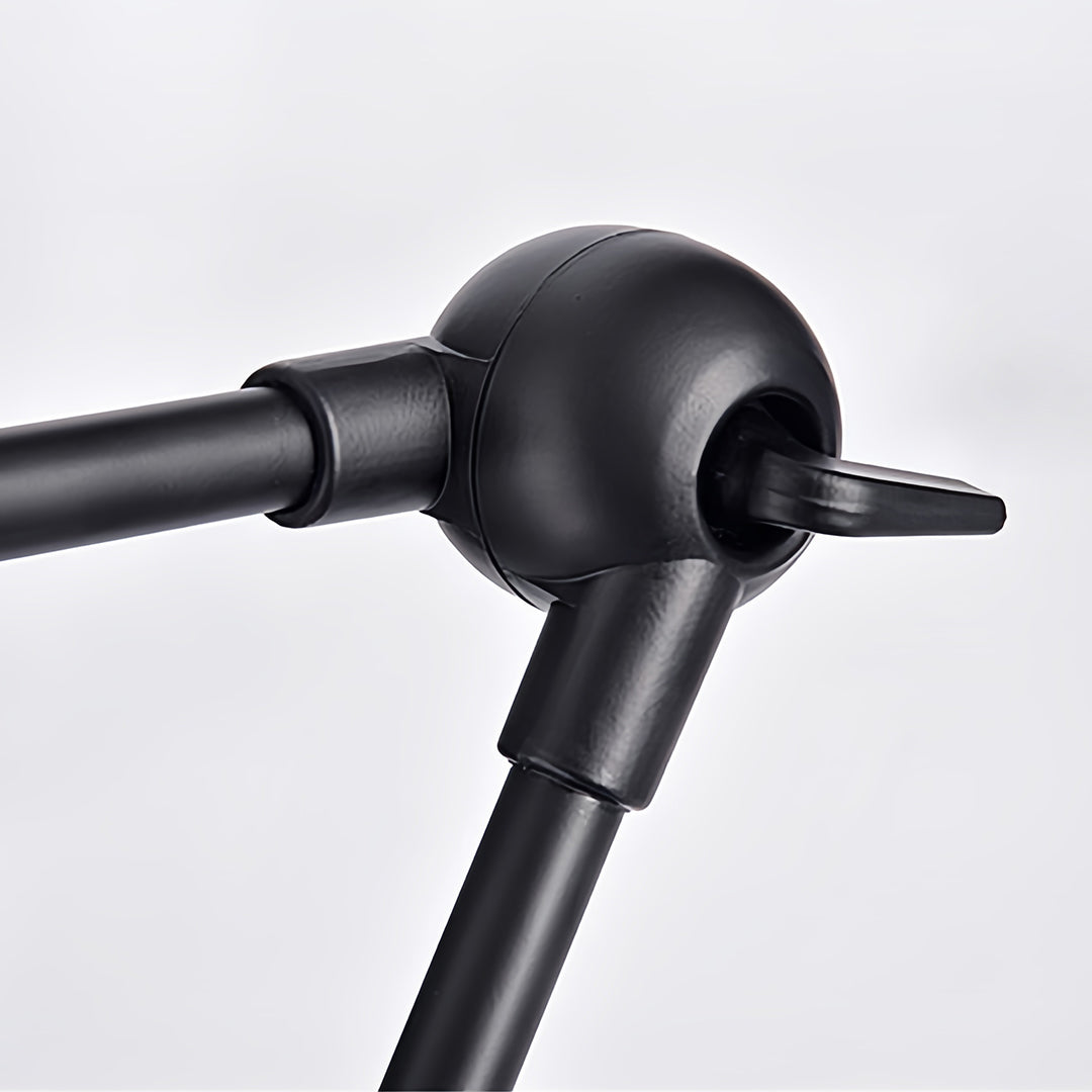 Articulated reading floor lamp with black finish and multiple adjustment points for customized lighting angles