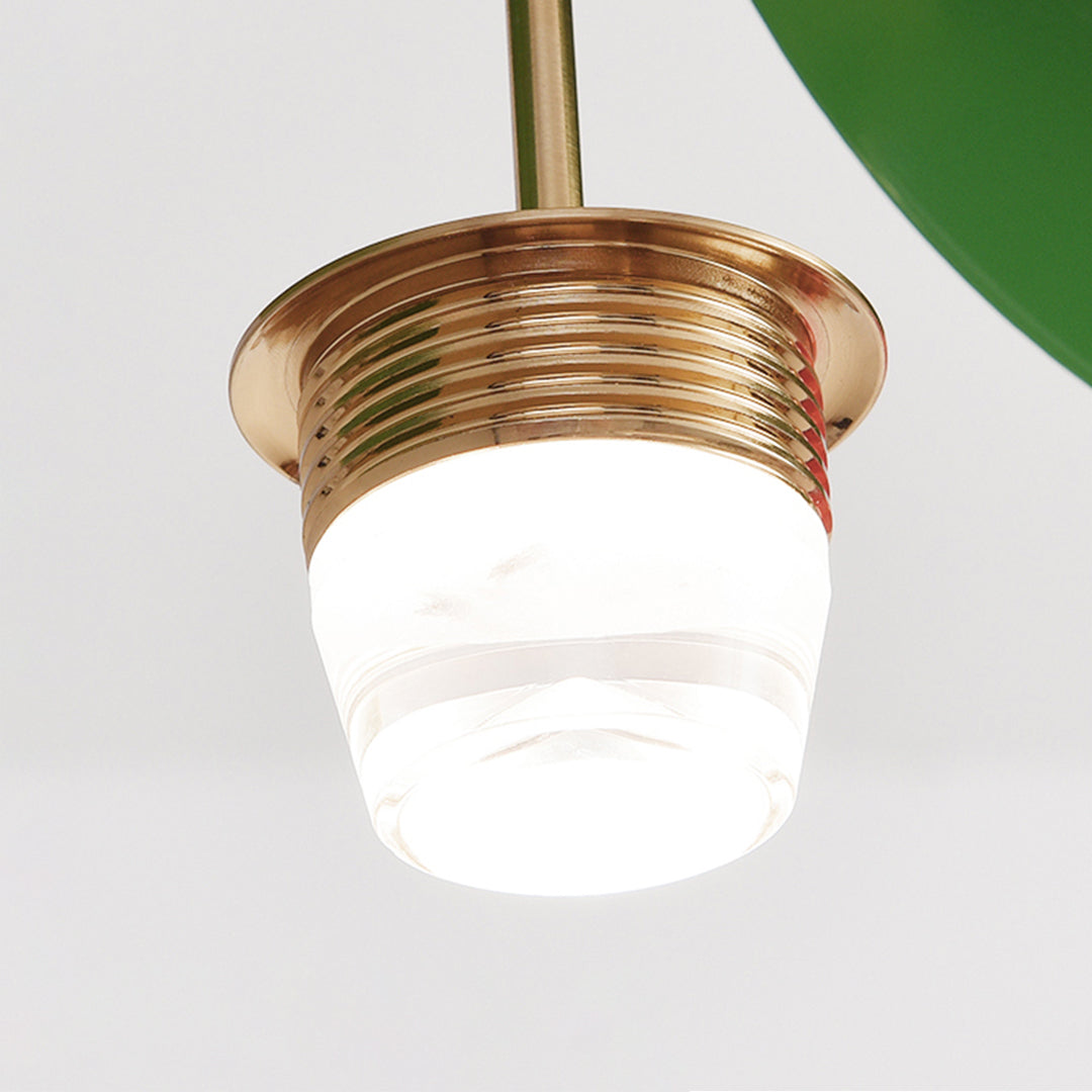 Artistic cherry ceiling light with textured amber glass globe and ribbed metallic finish in modern setting