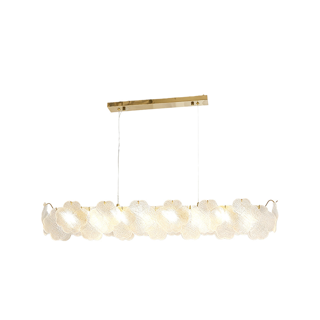 Artistic glass chandeliers hanging above a round table, creating a stylish focal point in a modern living space