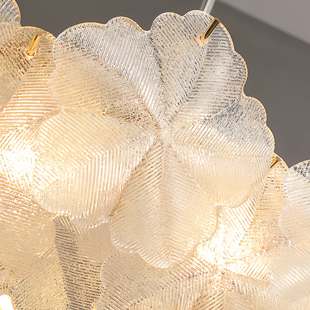 Artistic glass garland chandelier lights with delicate translucent elements creating ethereal lighting patterns