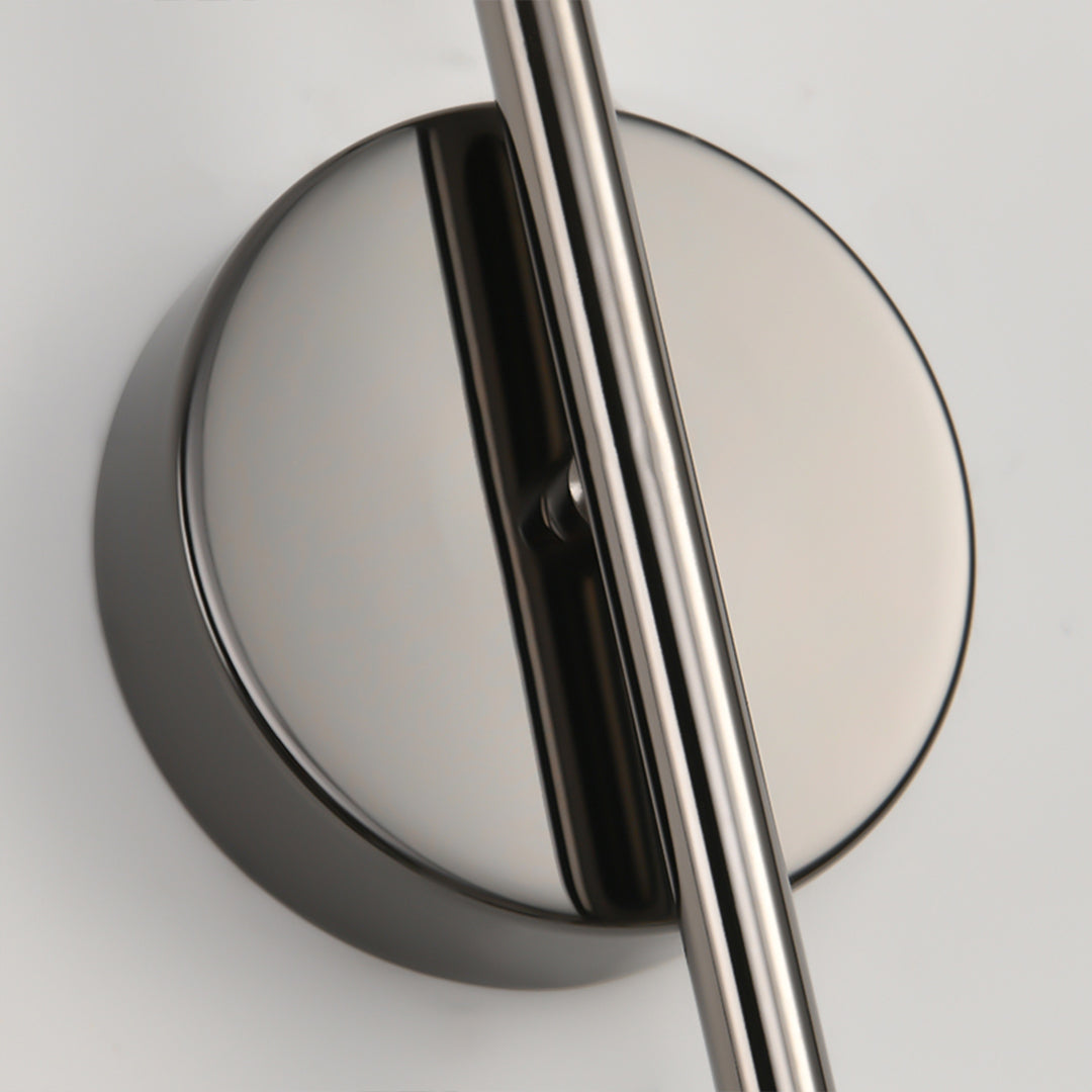 Artistic indoor wall mounted lights with reflective glass sphere creating ambient lighting effects