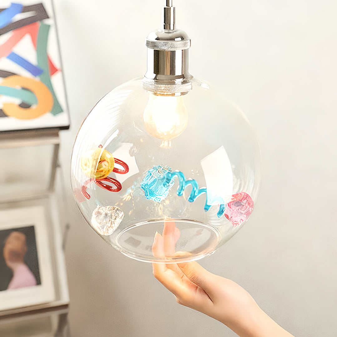 Artistic and small colorful glass pendant lights perfect for cafe lighting or stairwell accents.