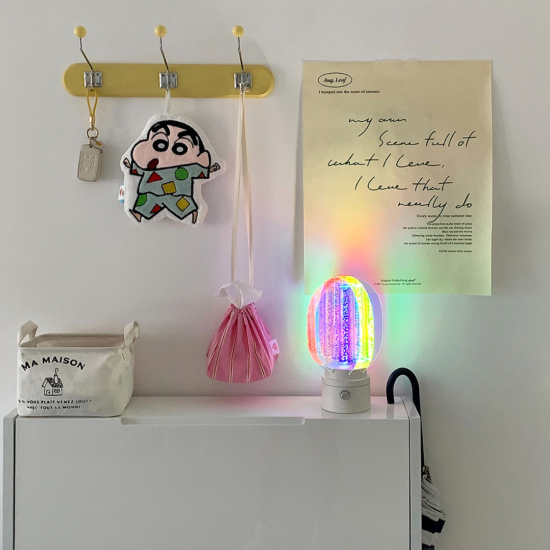 Unique colourful table lamps with artistic wall display creating vibrant interior design statement