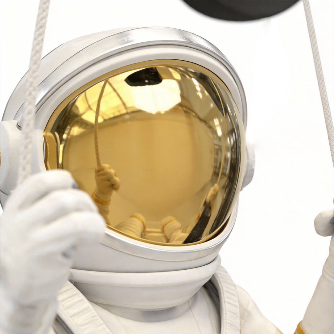 Astronaut wall light in a minimalist design, showcasing the astronaut and moon details.