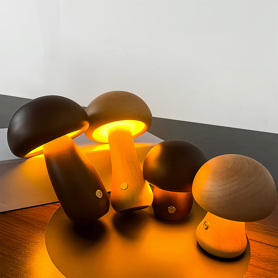 Assorted mushroom table lamps with warm orange glow creating atmospheric lighting display