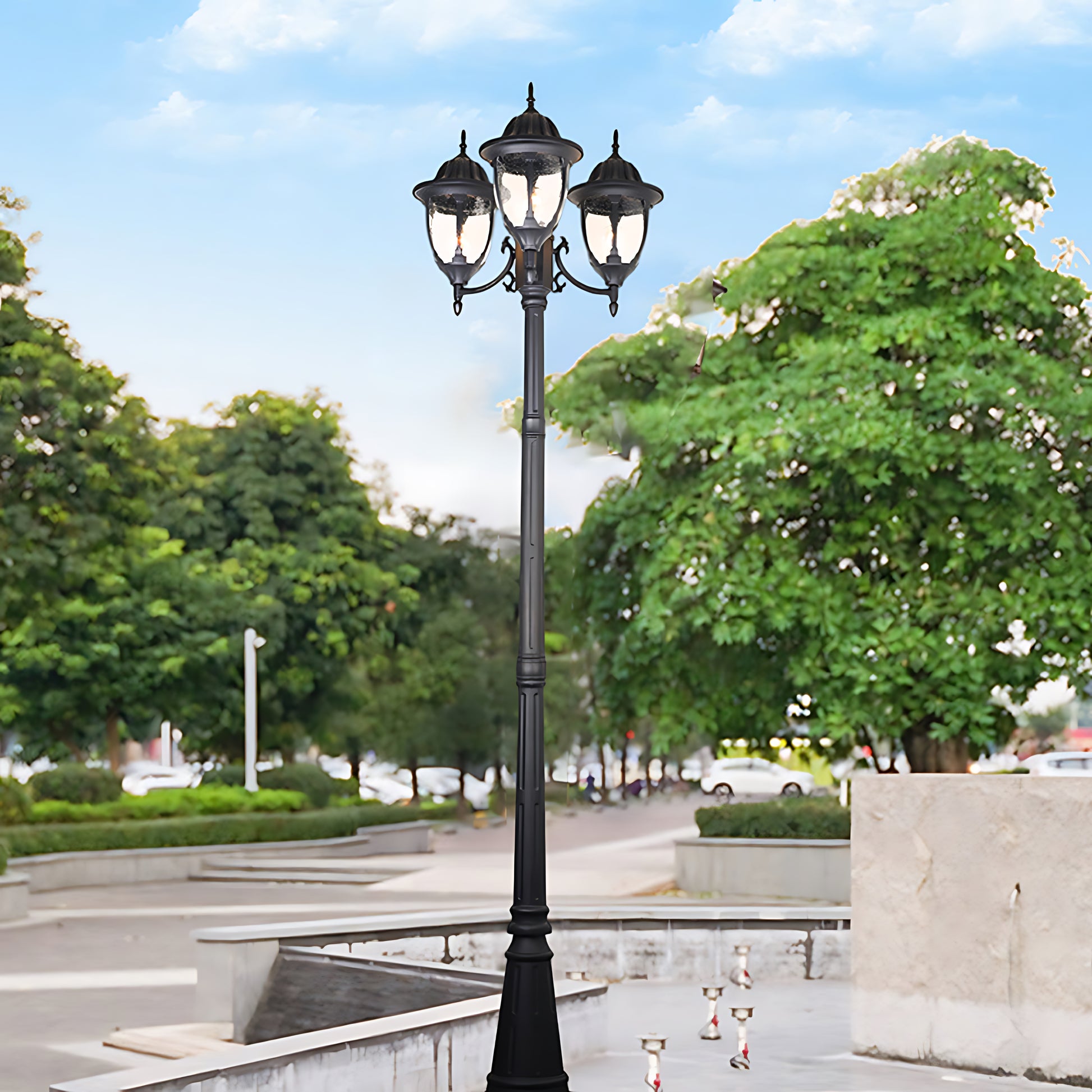 Traditional street lamp installed in public plaza with trees and urban landscape background