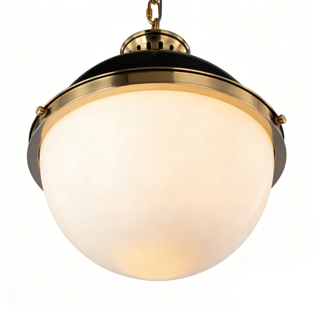 Classic ball pendant light with black and gold finish, featuring a frosted glass globe that provides soft ambient lighting for interiors.