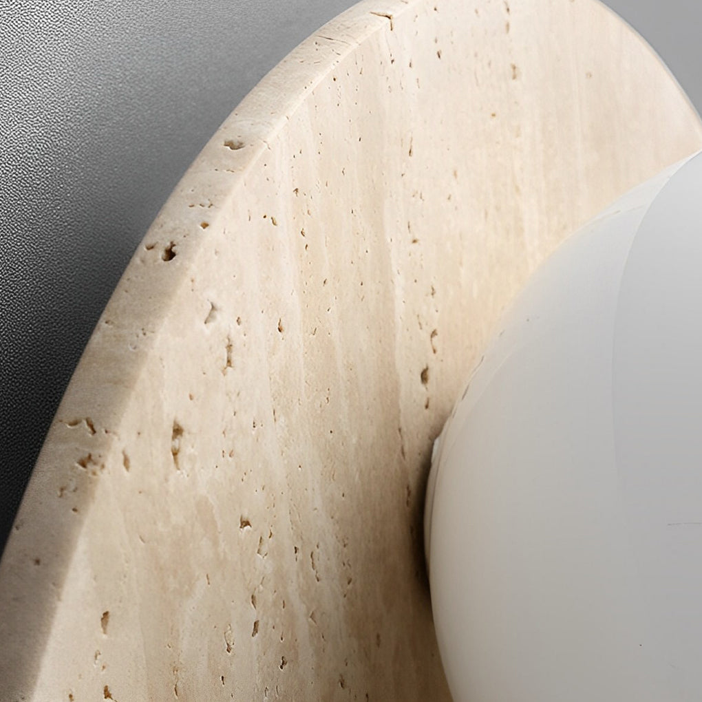 Ball wall lamp with a close-up of its wooden texture and circular light.