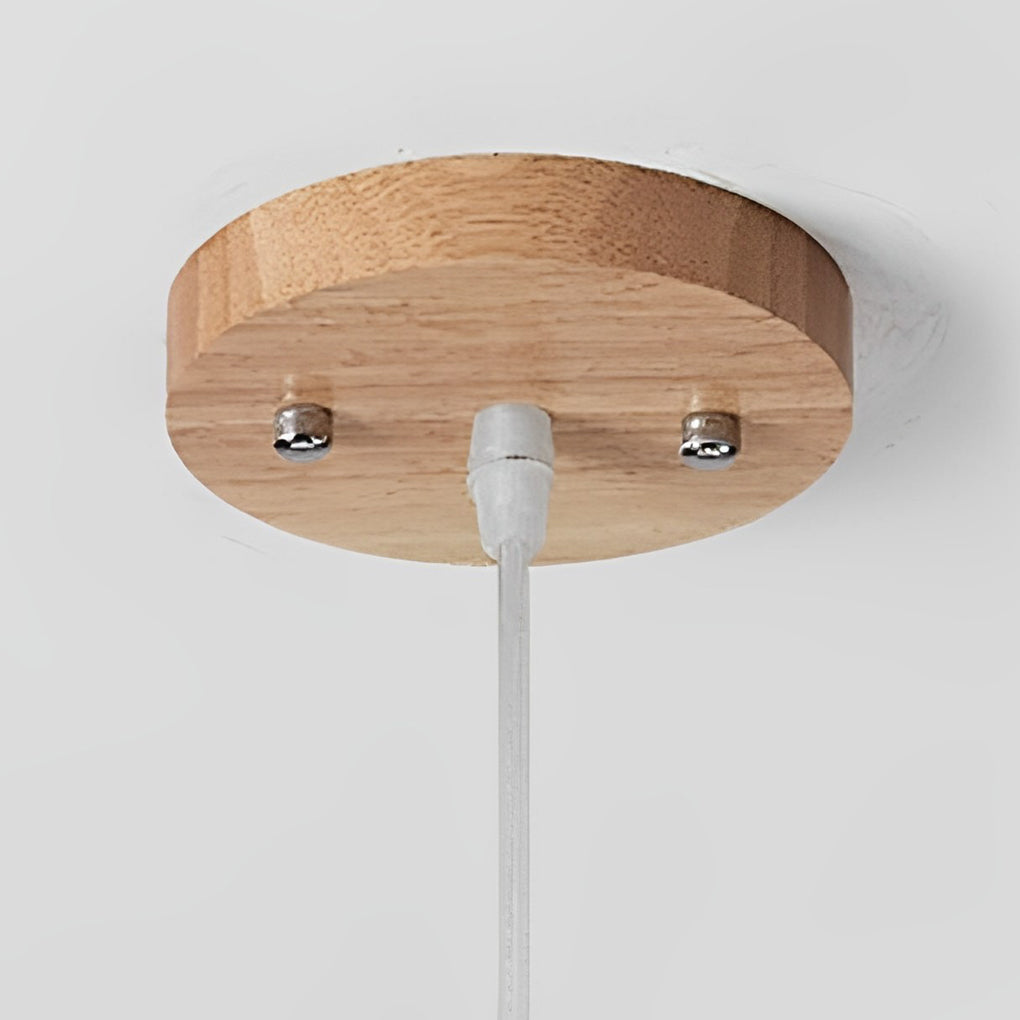 Bamboo pendant lights with a natural finish, mounted on a white ceiling.