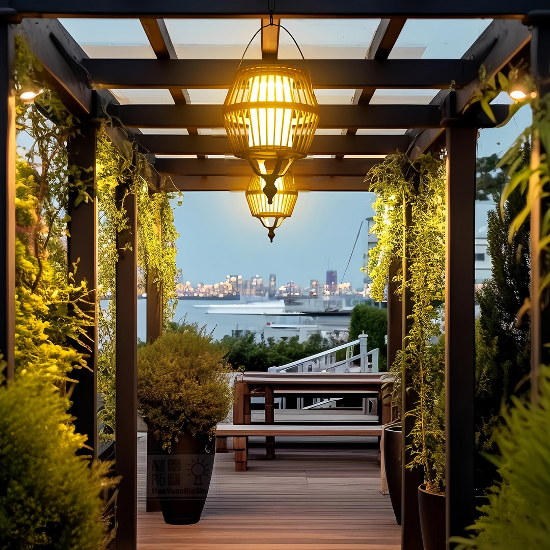 Spherical bamboo japanese lantern pendant light hanging from a pergola, set against a stunning cityscape view.