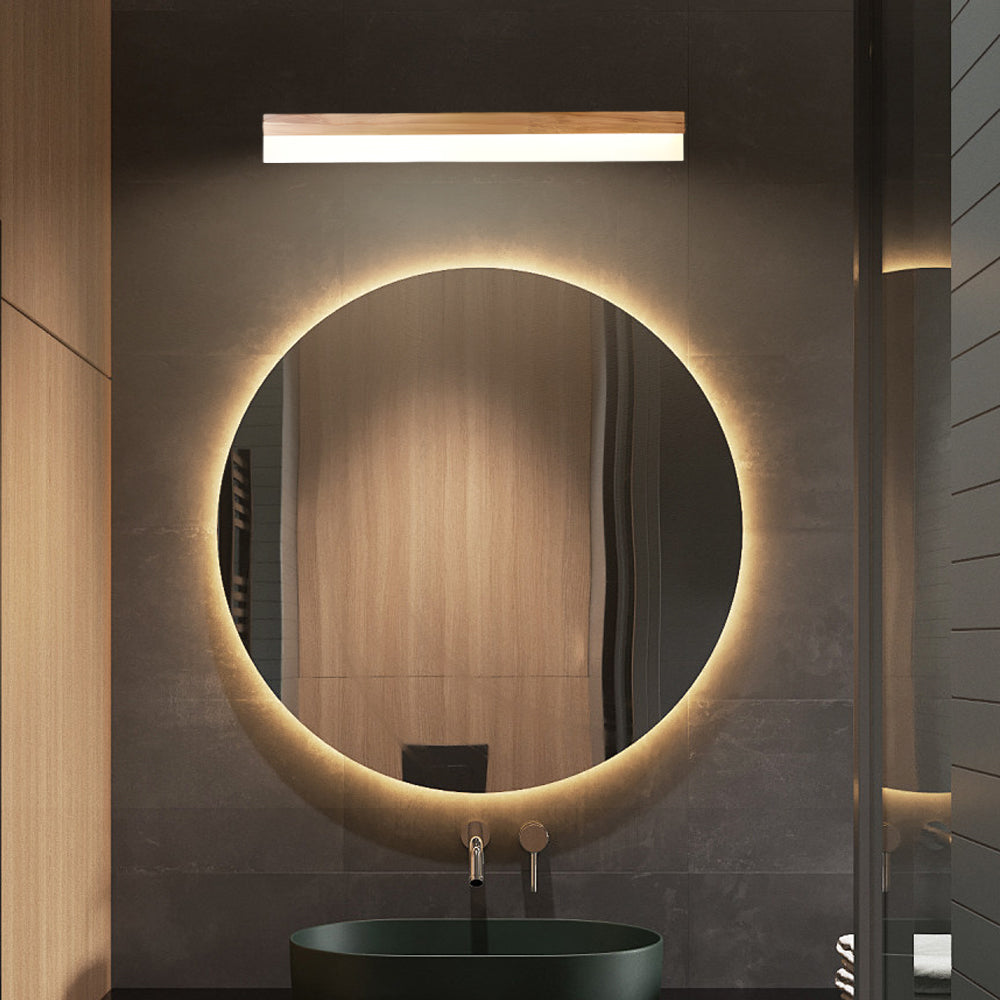 Bath bar vanity light with a modern design, providing warm illumination in a stylish bathroom.