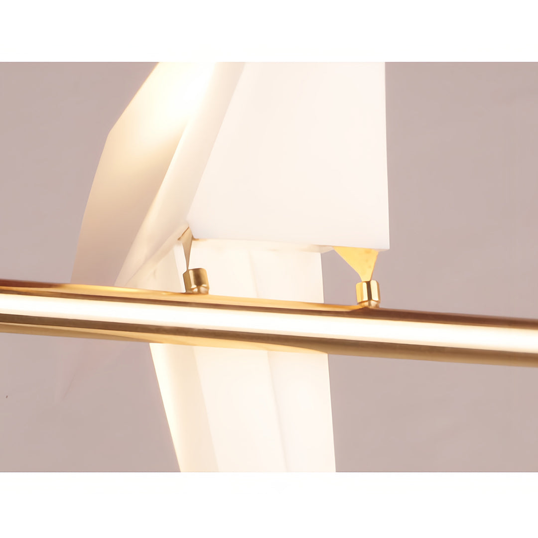 Statement bird wall light showcasing golden crane silhouettes in bathroom setting