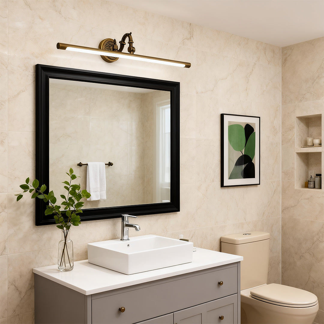 Bathroom LED vanity light brightening modern minimalist space with black-framed mirror and white walls.