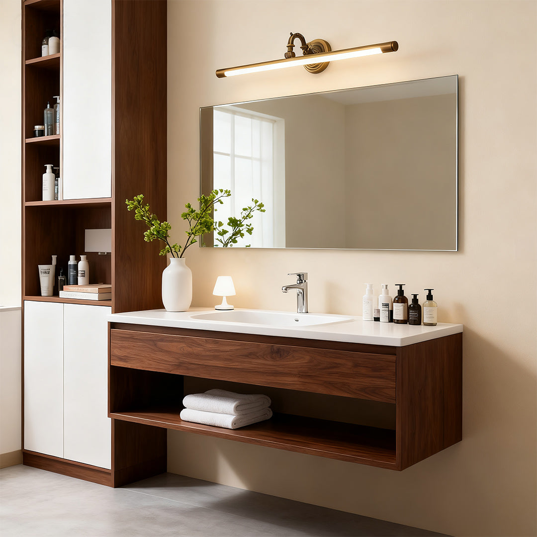 Bathroom LED vanity light enhancing wood vanity with white countertop in bright neutral bathroom.