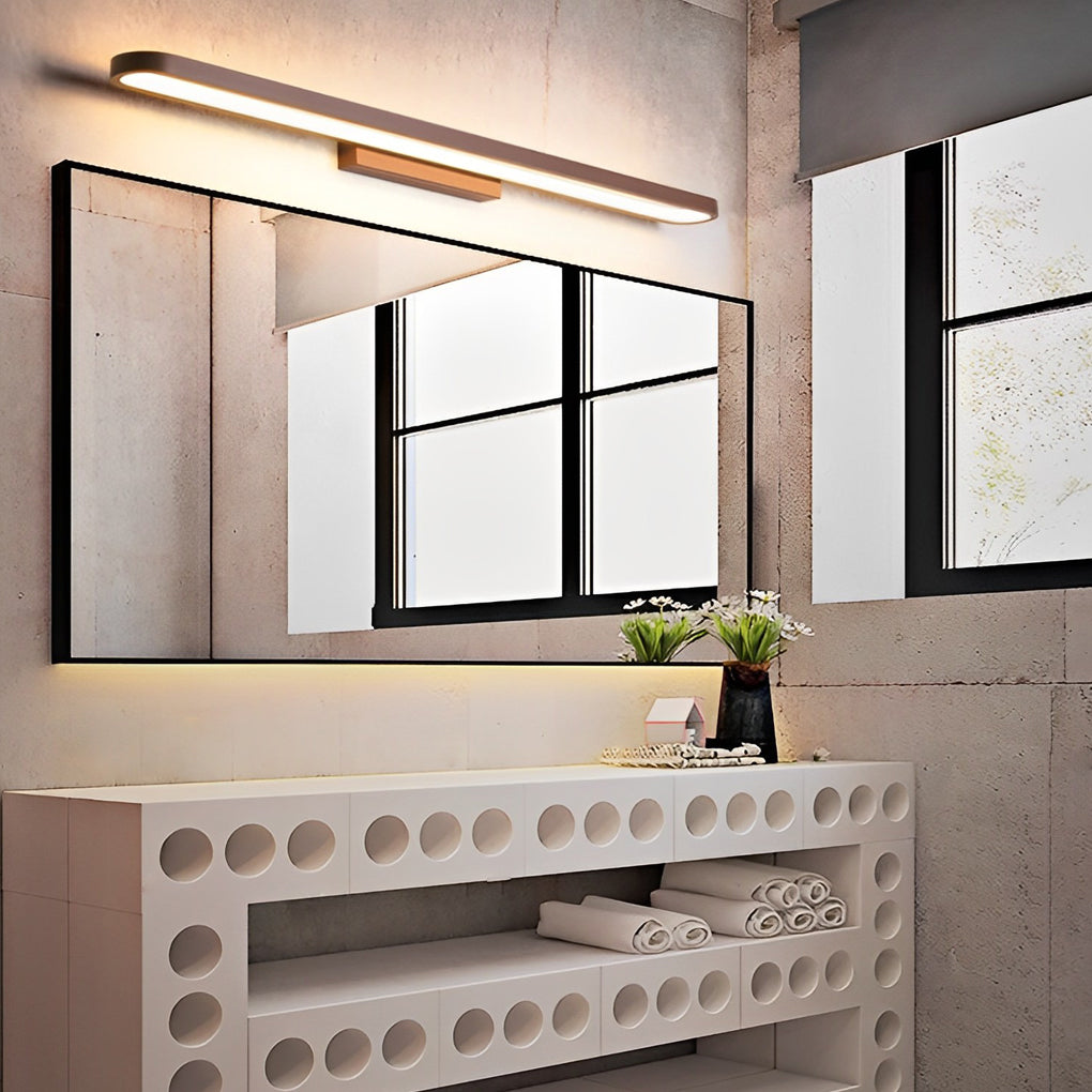 Linear bathroom vanity bar light paired with industrial-style mirror and concrete wall