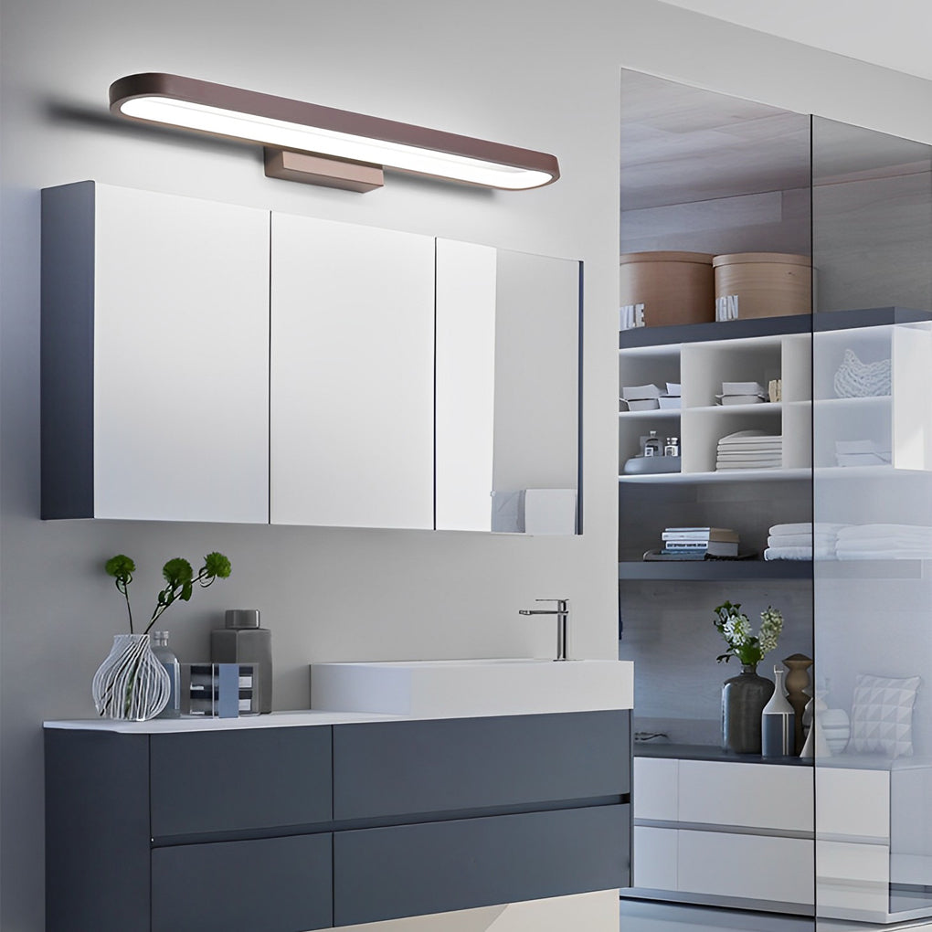 Slim bathroom vanity bar light installed above mirror cabinet in a modern bathroom