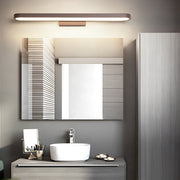 Modern bathroom vanity bar light installed above mirror with warm even illumination