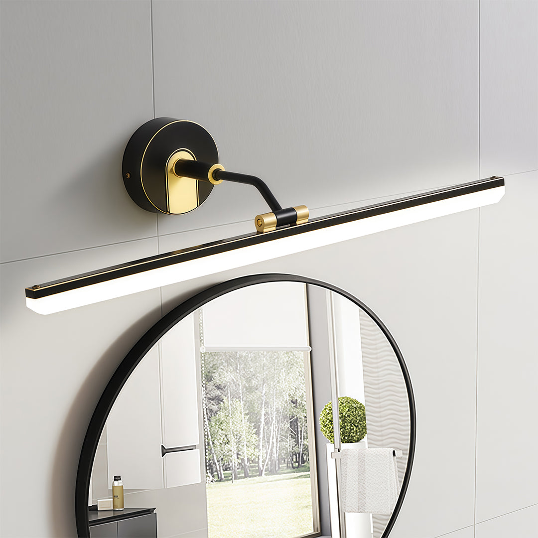 Black and gold bathroom vanity LED light above a round mirror in a stylish bathroom setting.