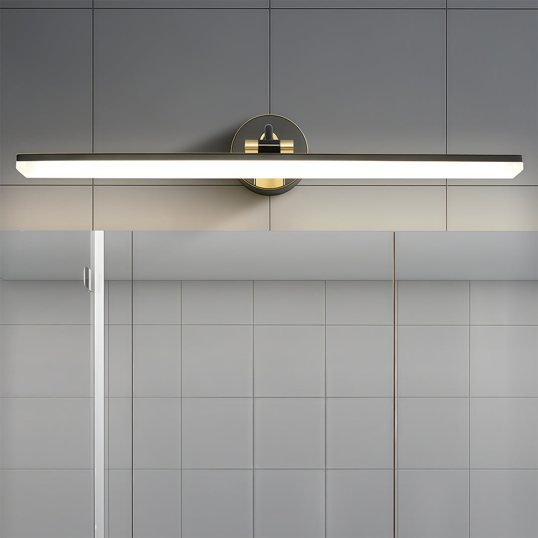 Black and gold bathroom vanity LED light mounted on a white wall, providing a clean and modern look.