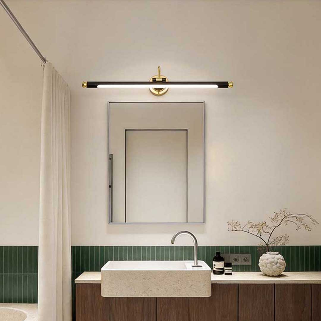Bathroom vanity light black and gold providing soft light in a stylish bathroom with a wooden vanity.