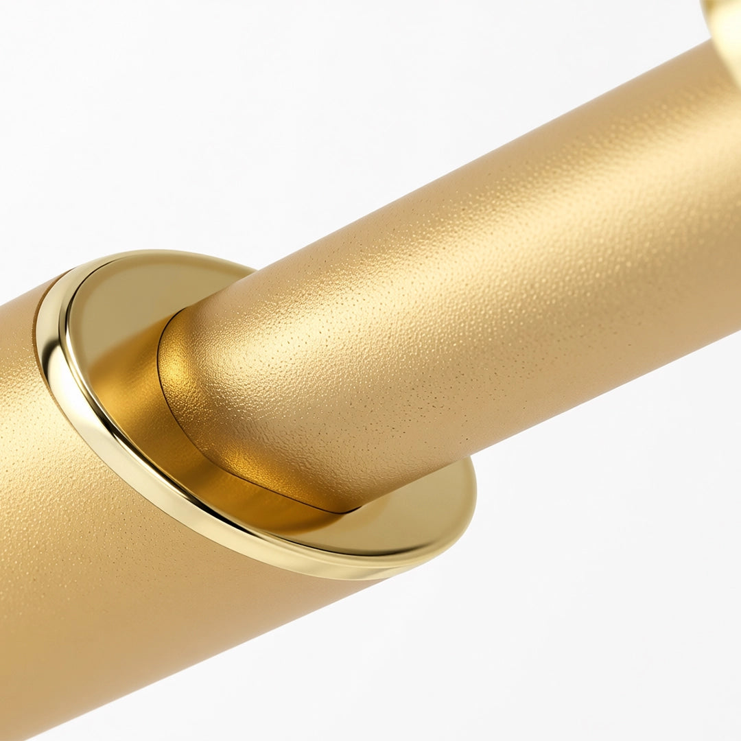 Close-up of the round backplate and textured gold light bar on bathroom vanity lights gold finish.