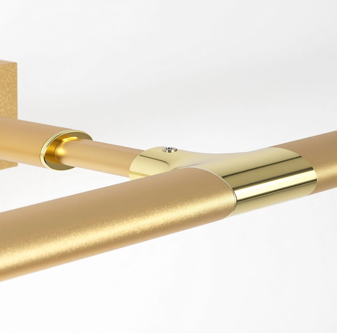 Close-up of the gold connector and slim light bar on bathroom vanity lights gold finish.