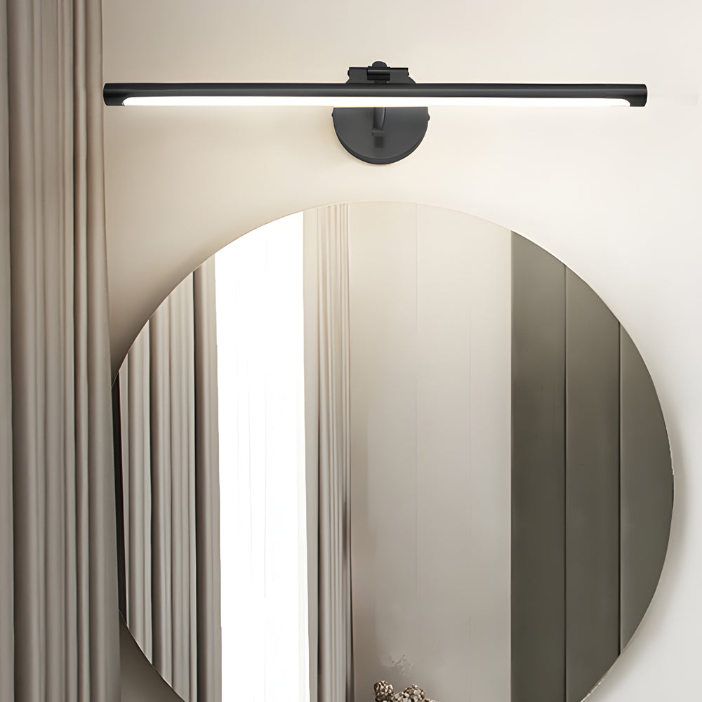 Contemporary bathroom vanity strip light with a gold finish, illuminating a bathroom mirror with a clean and elegant design.