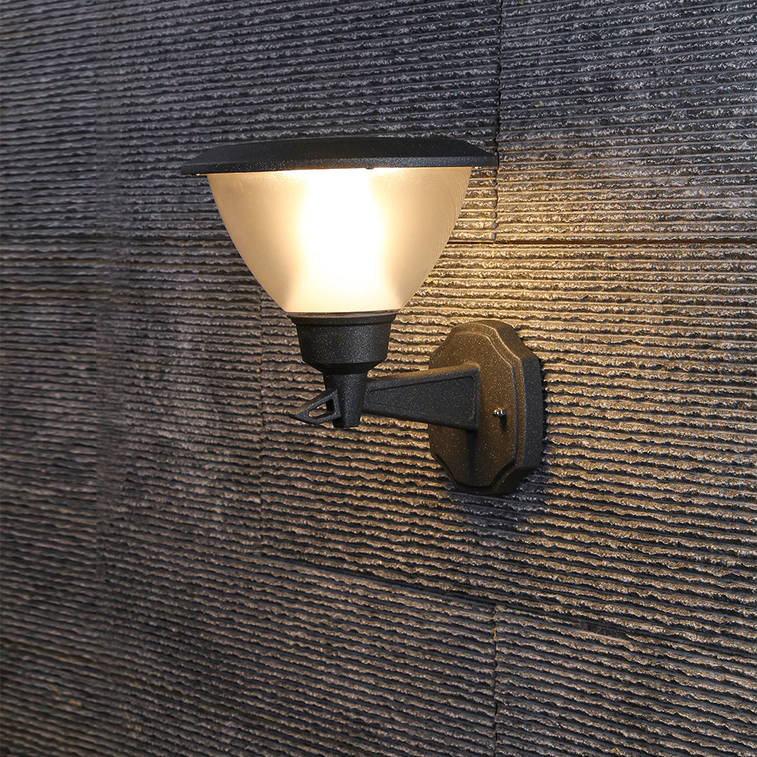 Warm LED wall light illuminating textured brick surface creating dramatic architectural lighting effects