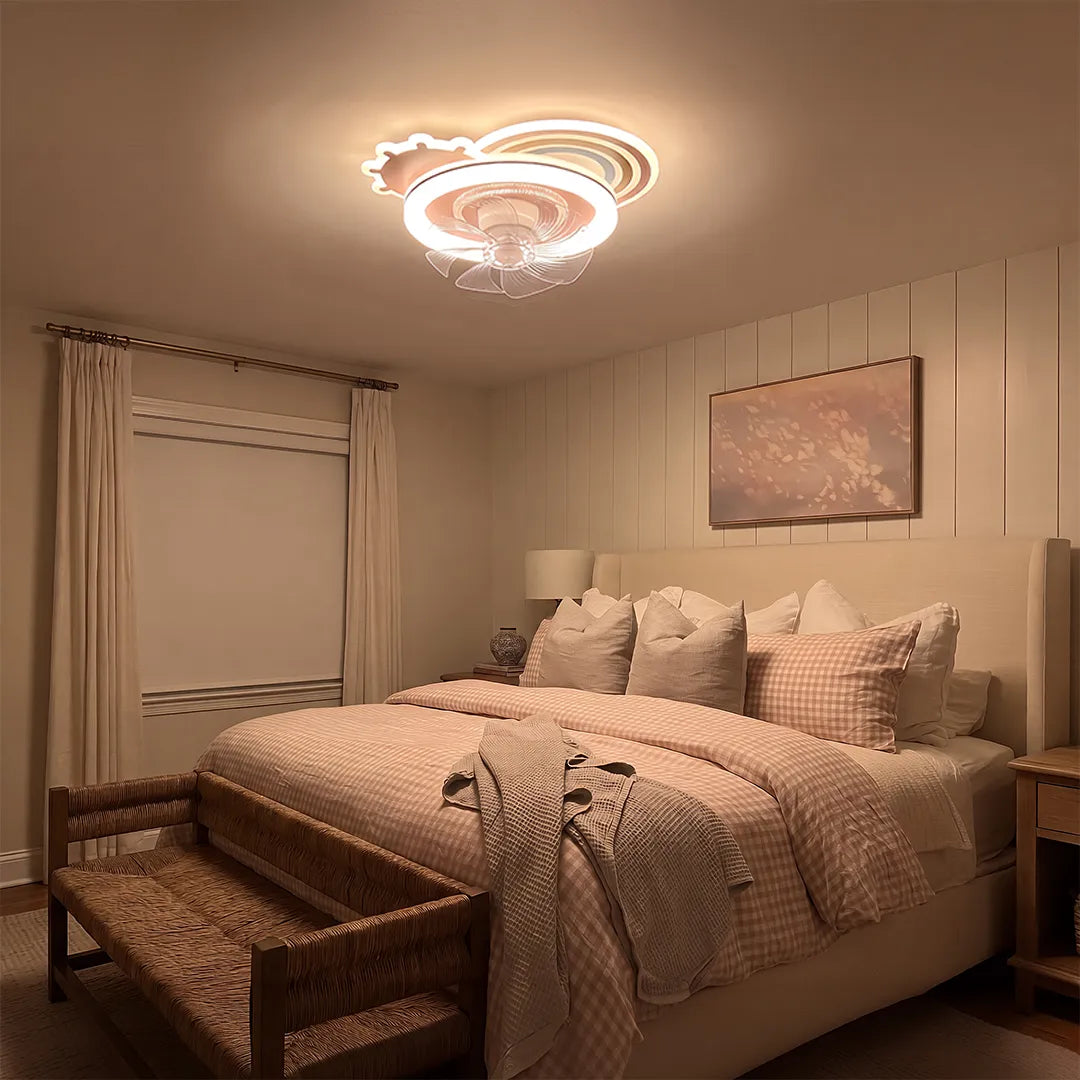 Beautiful ceiling fans with lights glowing in a cozy bedroom with warm neutral decor.