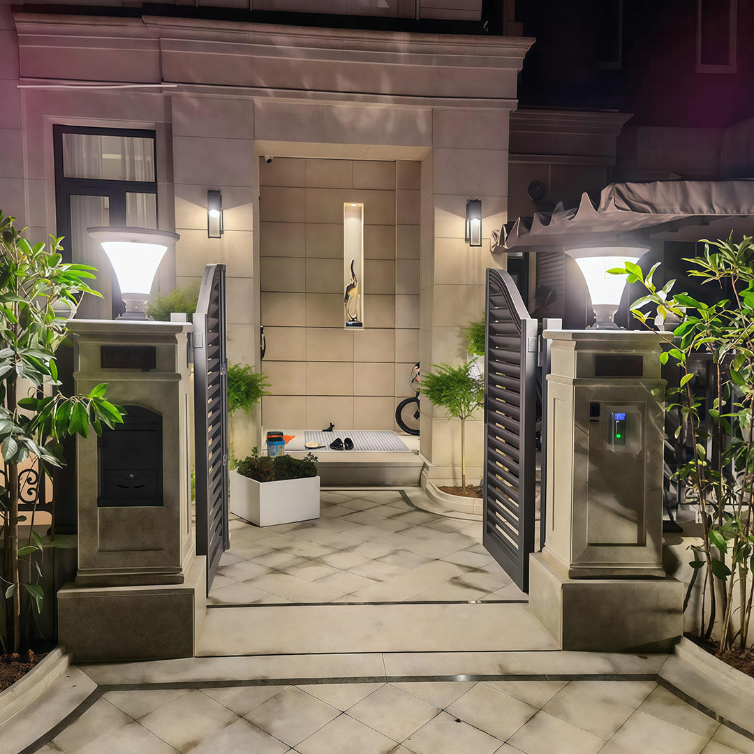 Beautiful garden light pillar creating a warm glow at the entrance gate.