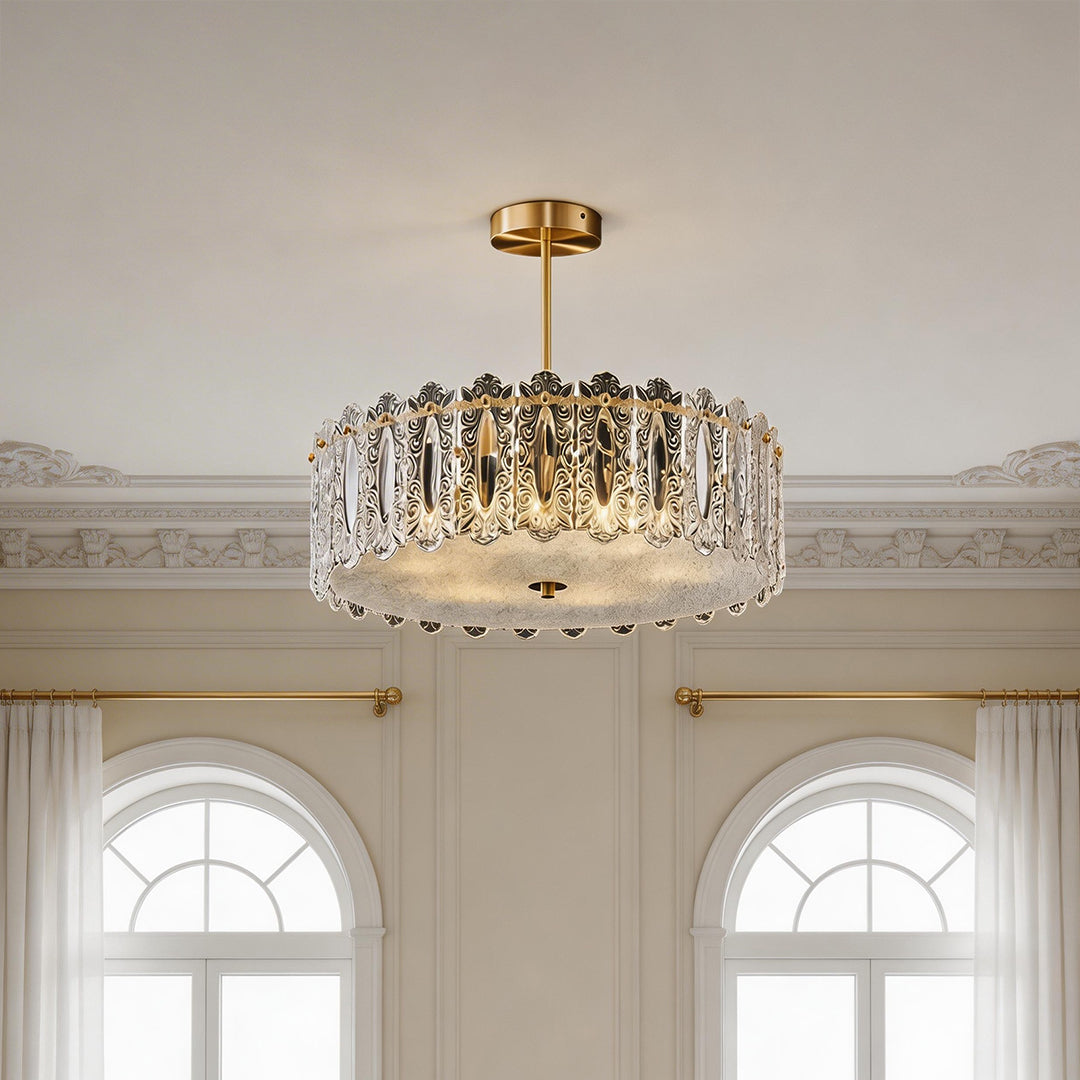 Beautiful glass semi flush mount lighting with a gold finish and vertical clear glass prisms.