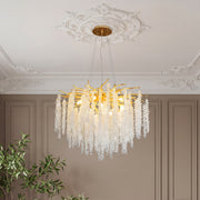 Beautiful modern gold crystal chandelier featuring gold branches and cascading clear crystals.