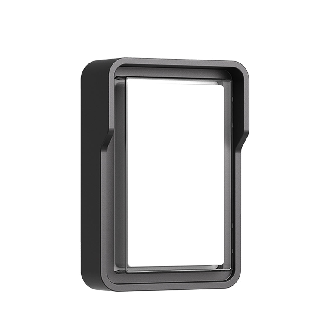 Contemporary outdoor wall light with horizontal slats mounted on building exterior fence area