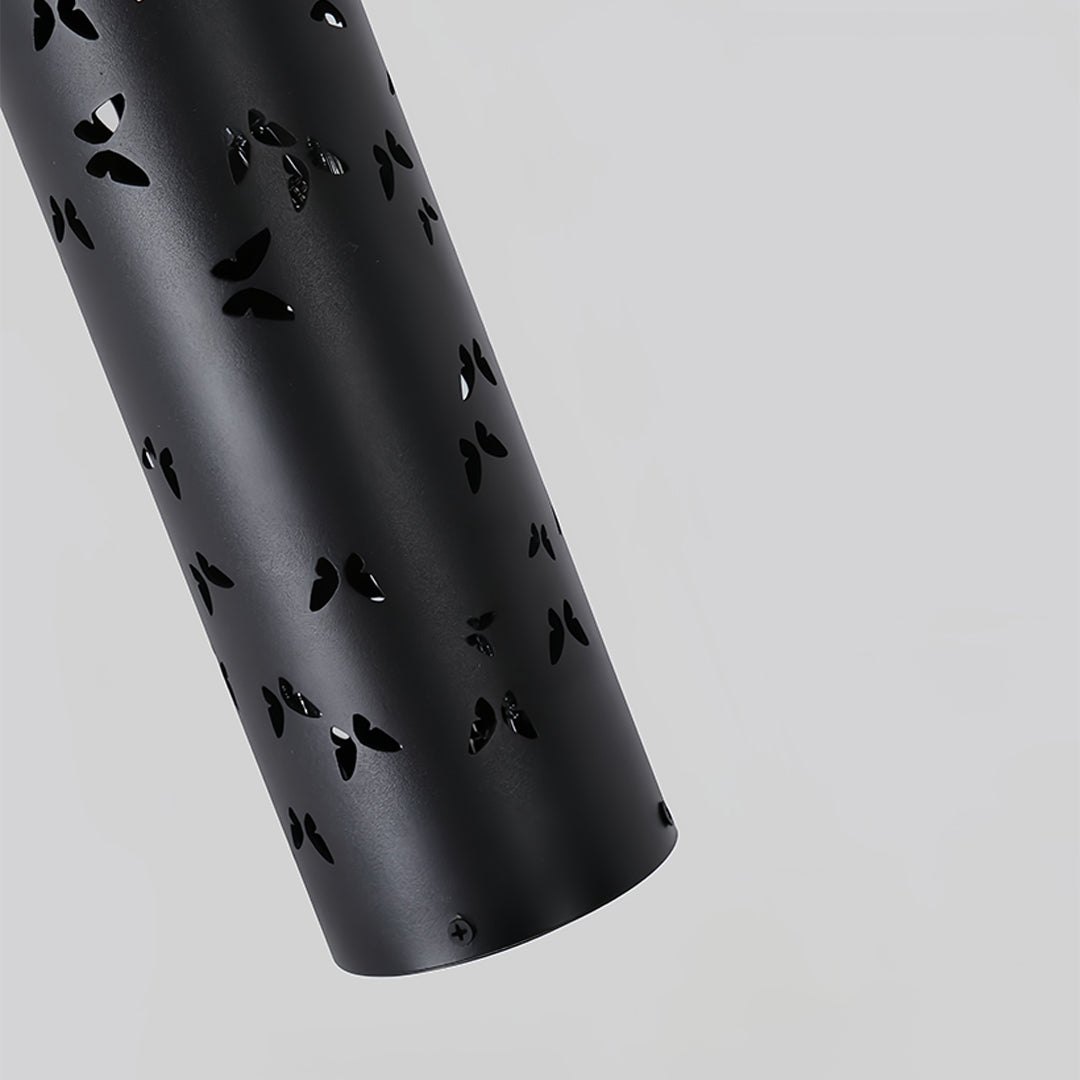 Elegant bedroom setup showcasing small black pendant light with romantic shadow projections