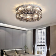 Stylish bedroom interior displaying elegant ceiling round led lights with circular crystal chandelier