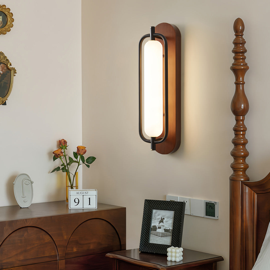 Wall mount outdoor solar lights mounted beside a wooden bedframe in a cozy interior.